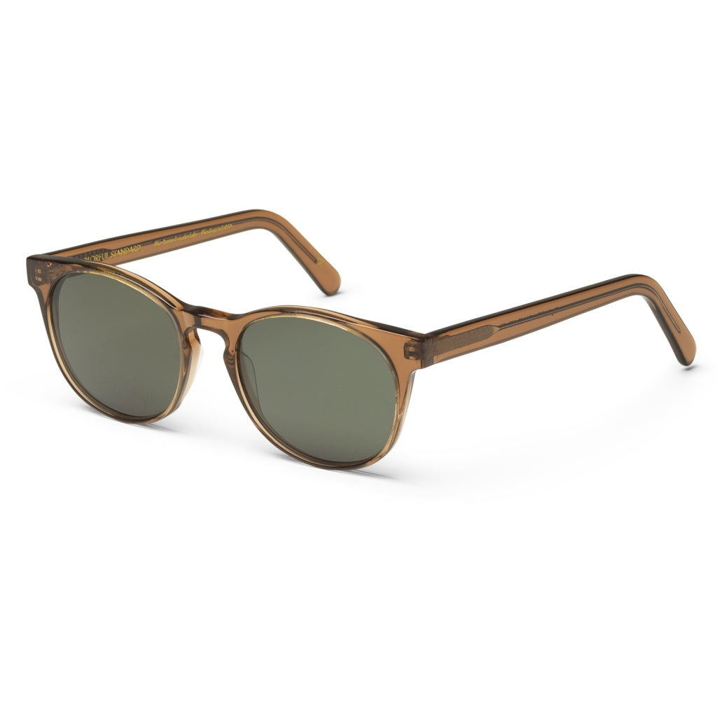 A pair of round, bio-based acetate sunglasses with green lenses and thin frames, isolated on a white background. "Sunglass 15 - Coffee Brown" by Colorful Standard.