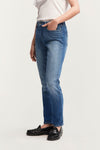 Woman wears Denham Margot jeans