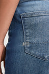 Woman wears Denham Margot jeans