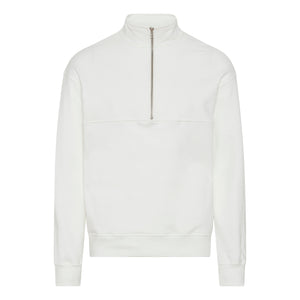 White 1/4 zip front oversized white sweater by Colorful standard against a white backdrop 