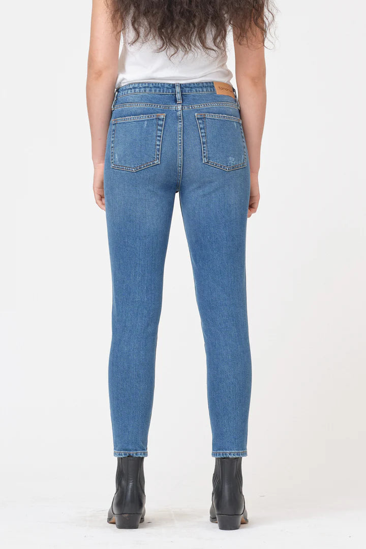 The back view of a woman wearing Tomorrow Denim's Hepburn Slim Jeans - Brooklyn.