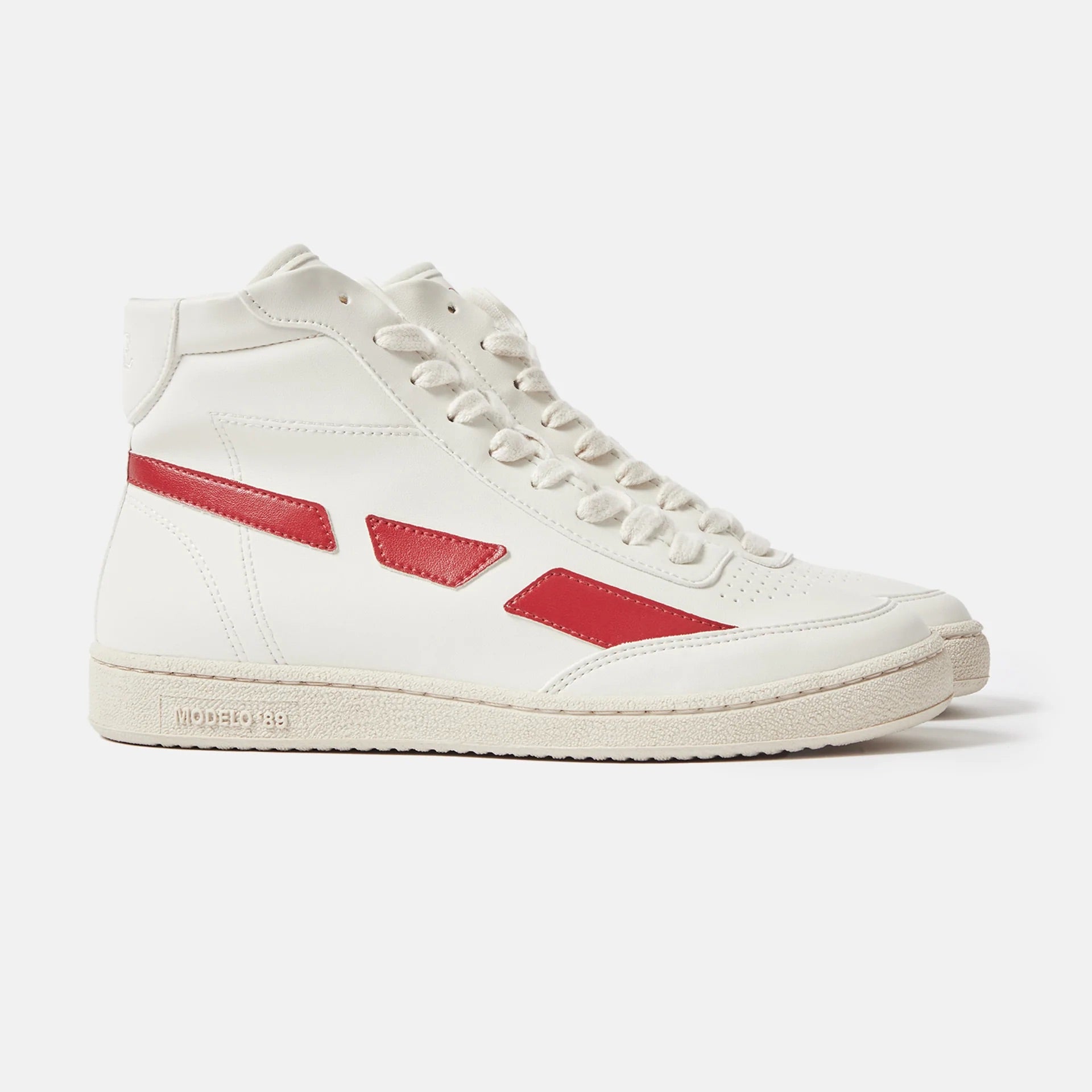 A white and red SAYE Modelo '89 Hi Sneaker made with vegan leather.