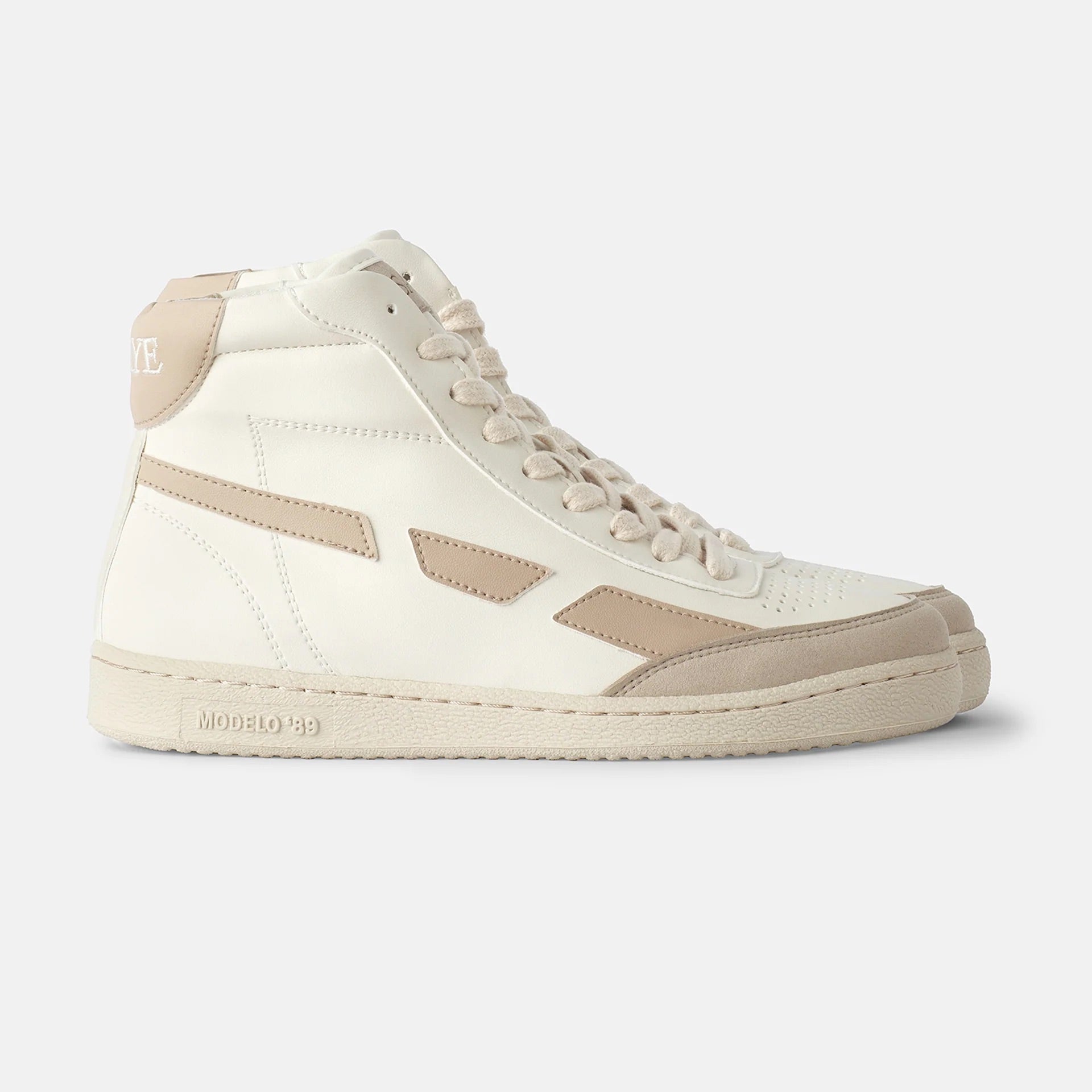 A beige high top sneaker named Modelo '89 Hi Sneakers - Beige made by SAYE, with bio-based vegan leather and featuring bamboo lining, showcased on a pristine white background.
