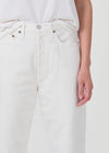 Woman wears Agolde 90's pinch crop in white