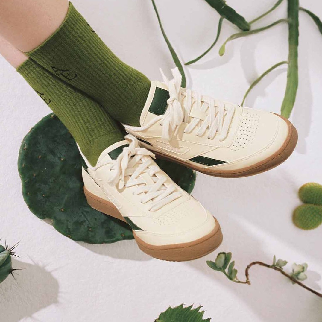 A pair of SAYE Modelo '89 Sneakers - Cactus from the Greens Capsule collection featuring cactus plants on them.