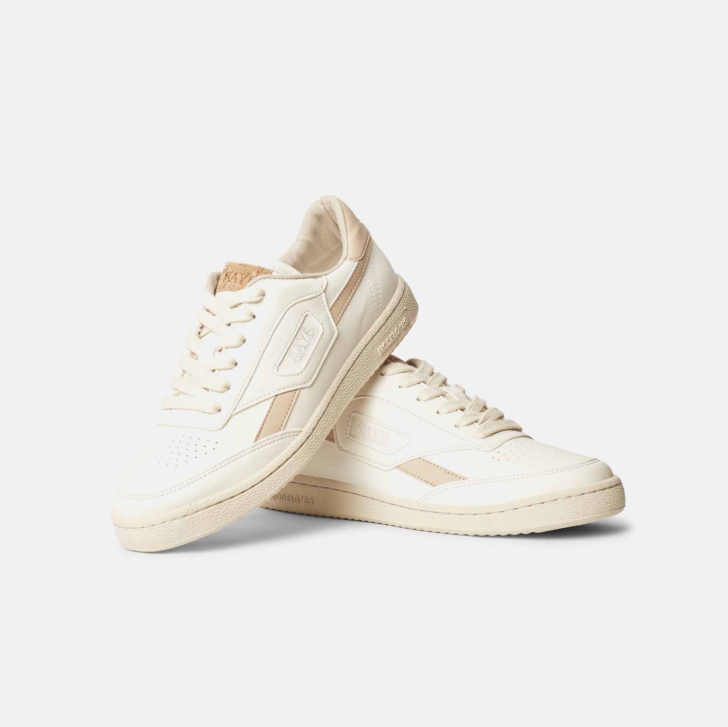 A pair of SAYE Modelo '89 Sneakers - Beige on a white surface.
