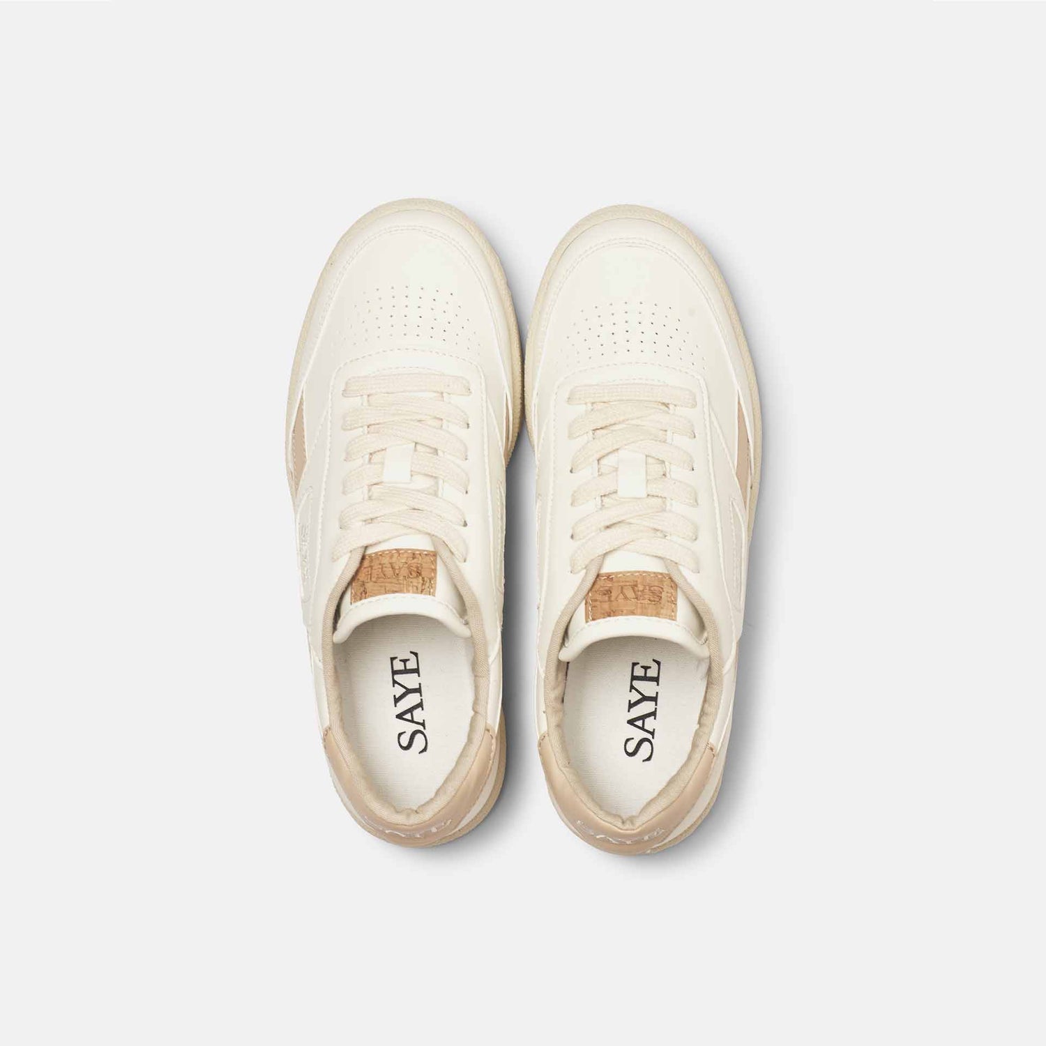 A pair of SAYE Modelo '89 Sneakers - Beige from the '80s, on a white surface.