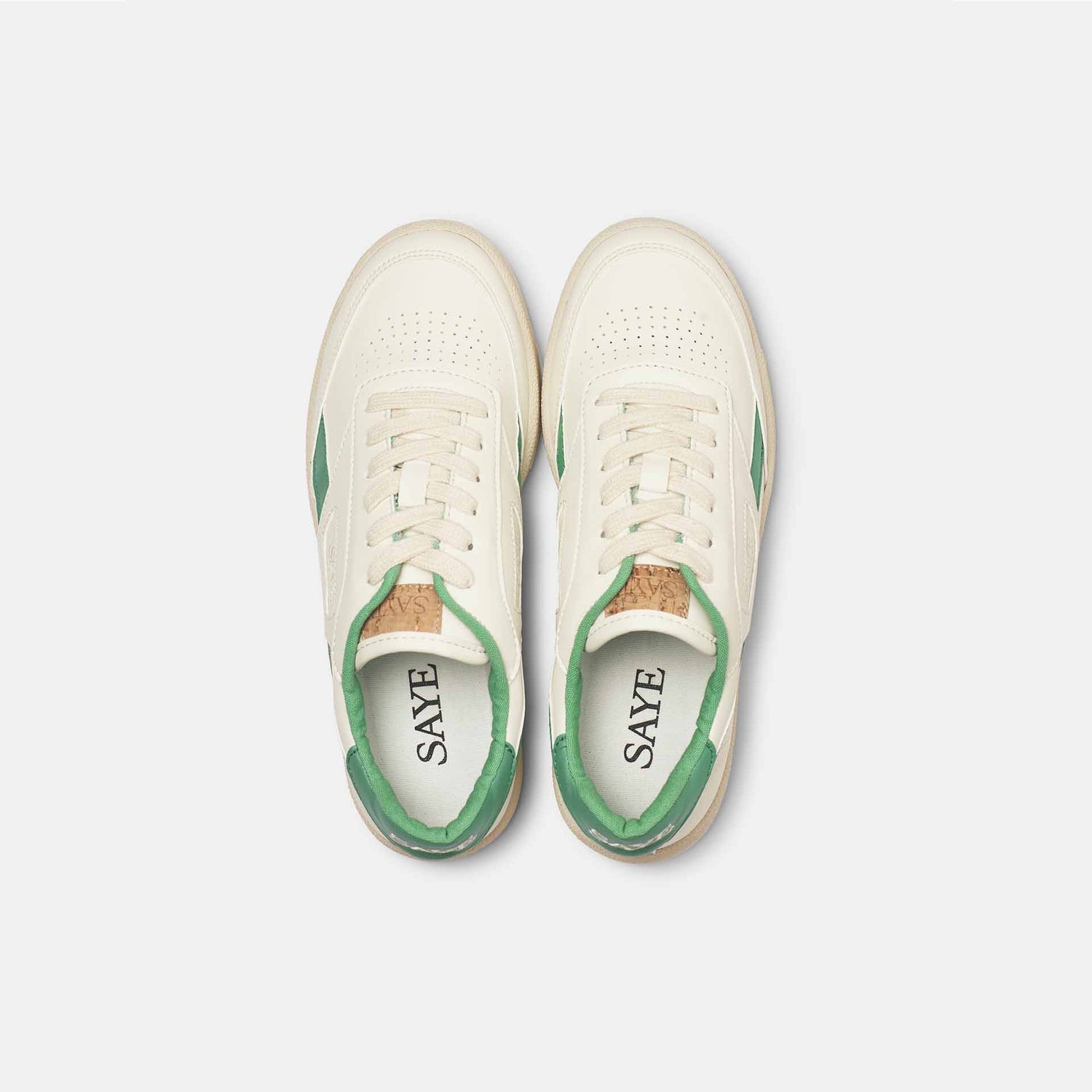 A pair of SAYE Modelo '89 Sneakers - Green, crafted from recycled and organic materials, including vegan Napa. The sneakers are displayed on a white surface.