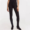Woman wears black skinny needle jeans by Denham