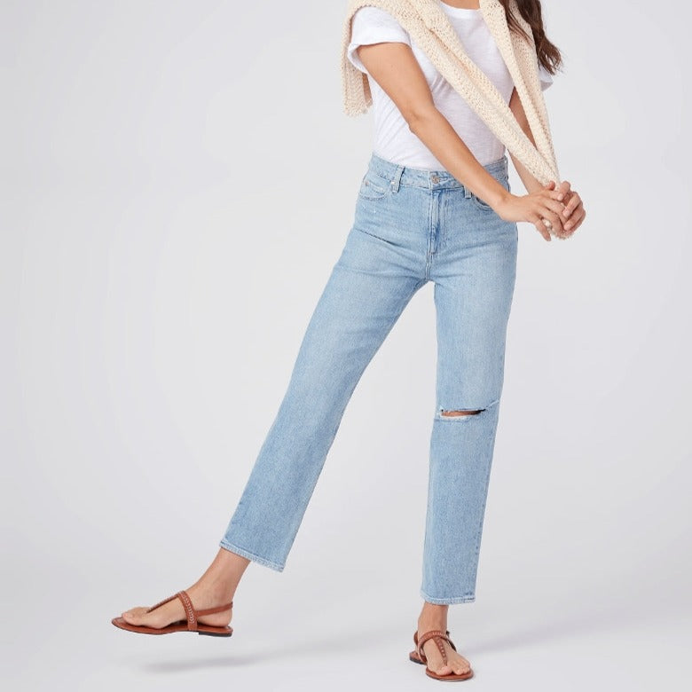 A woman wearing Paige's Noella Straight Jeans - Montague Destructed.